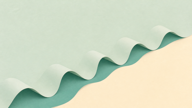 Layered green paper waves rising and falling across a cream background.