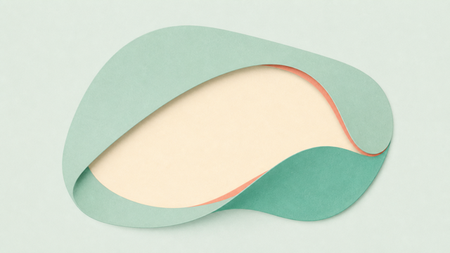 Overlapping cream and green forms creating a soft protected center.